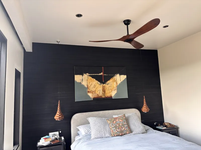 Bedroom ceiling fan and bedside pendant lighting by Espire Electrical