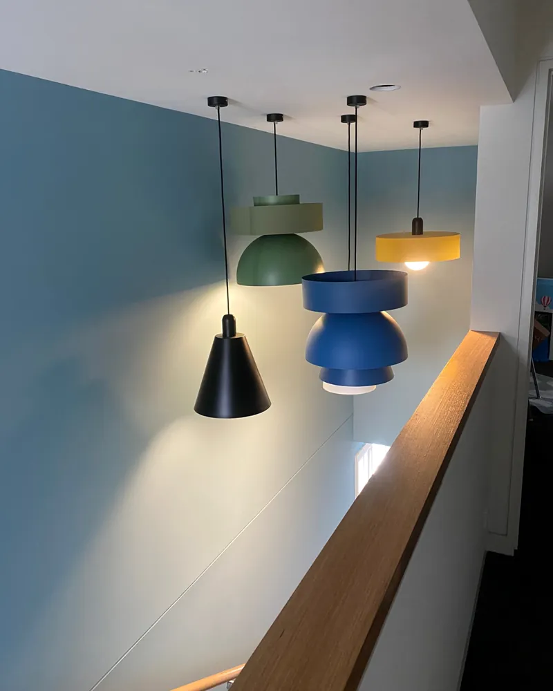 Colourful staircase pendant lights installed by Espire Electrical